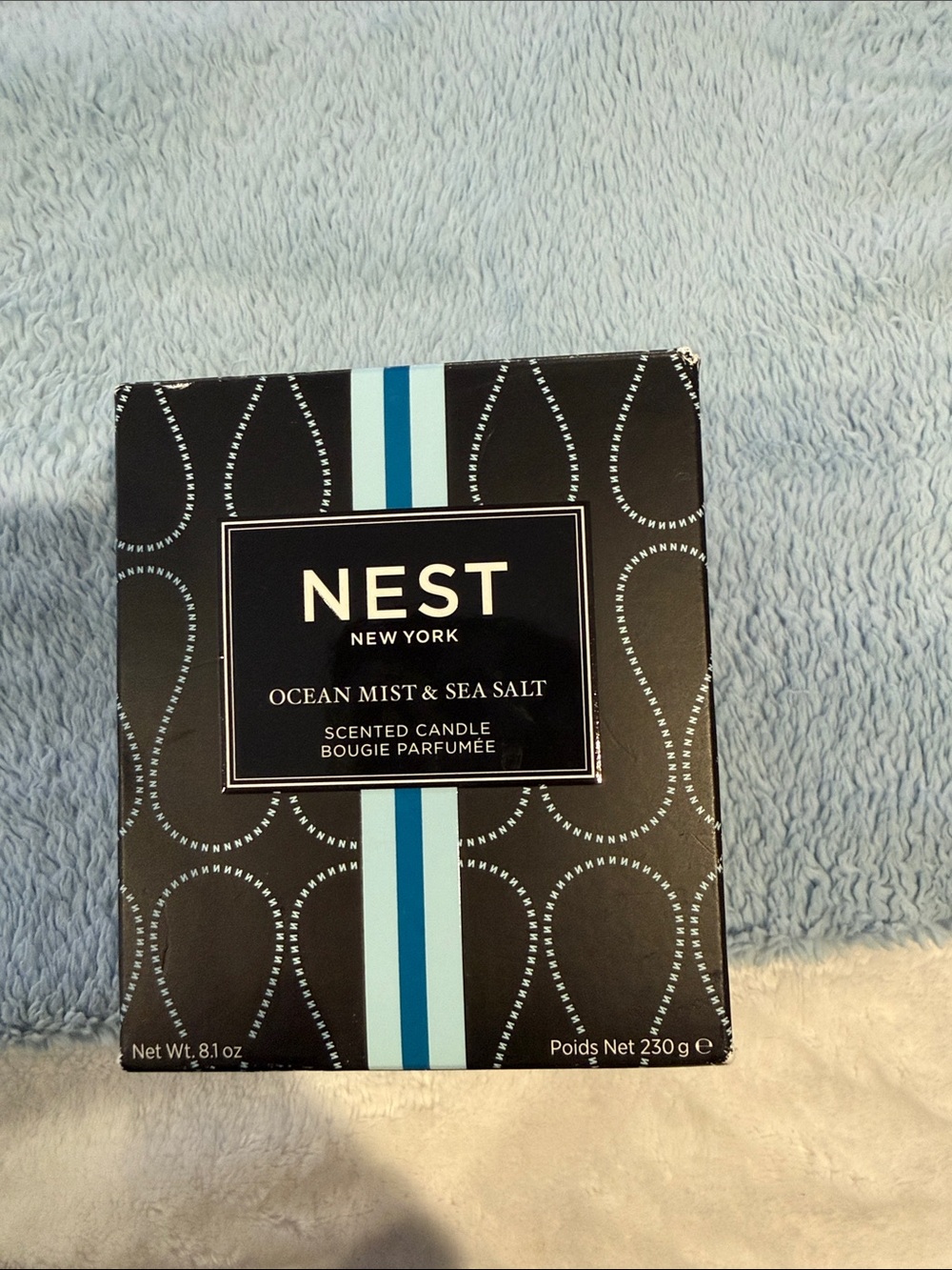 NEST Ocean Mist & Sea Salt Candle in Black and Blue Packaging